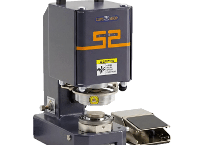 ClipsShop CS-TIDY-52 pneumatic grommet machine with a built-in carrying handle and an attached metal foot pedal on white background.
